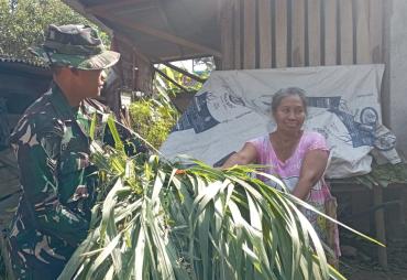 Satgas TMMD dan Warga Kompak Turunkan Rumput
