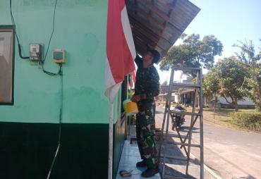 Satgas TMMD dan Warga Percantik Pos Kamling